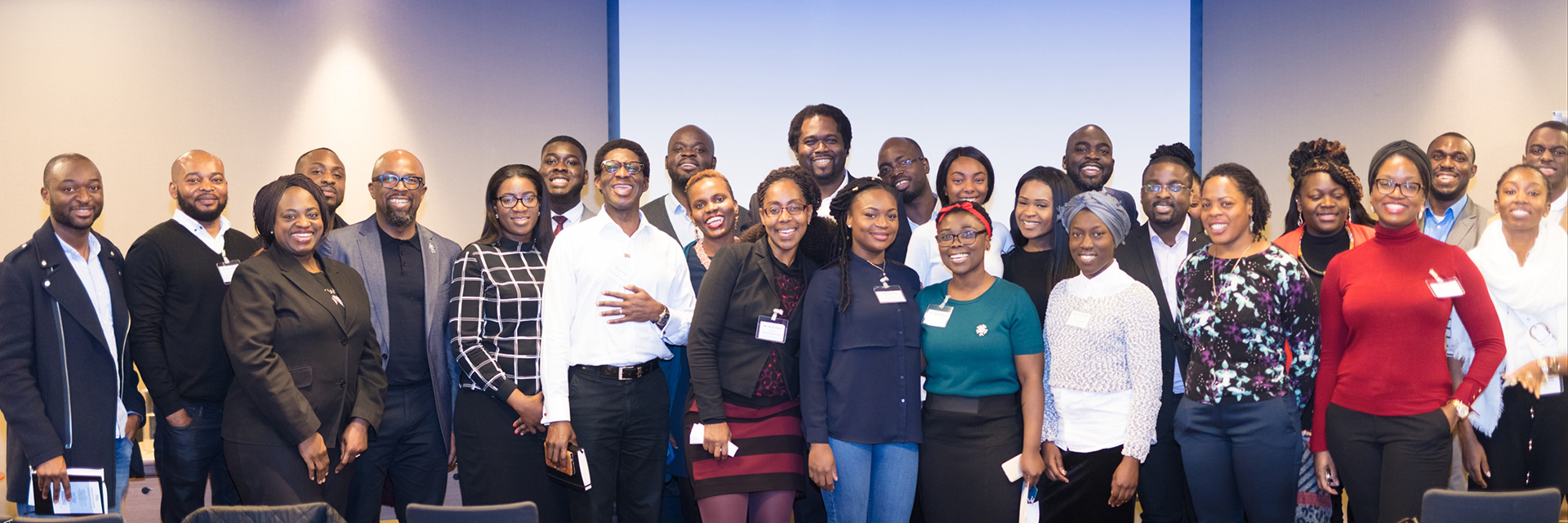 A large group of Black professionals and community members gathered at a Cee4Bee event