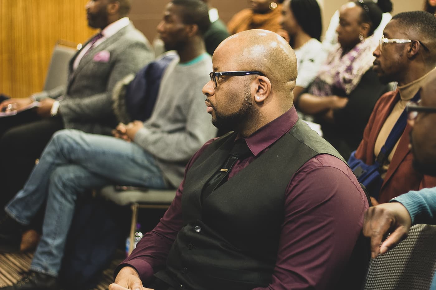 An attendee following a pitch from the audience