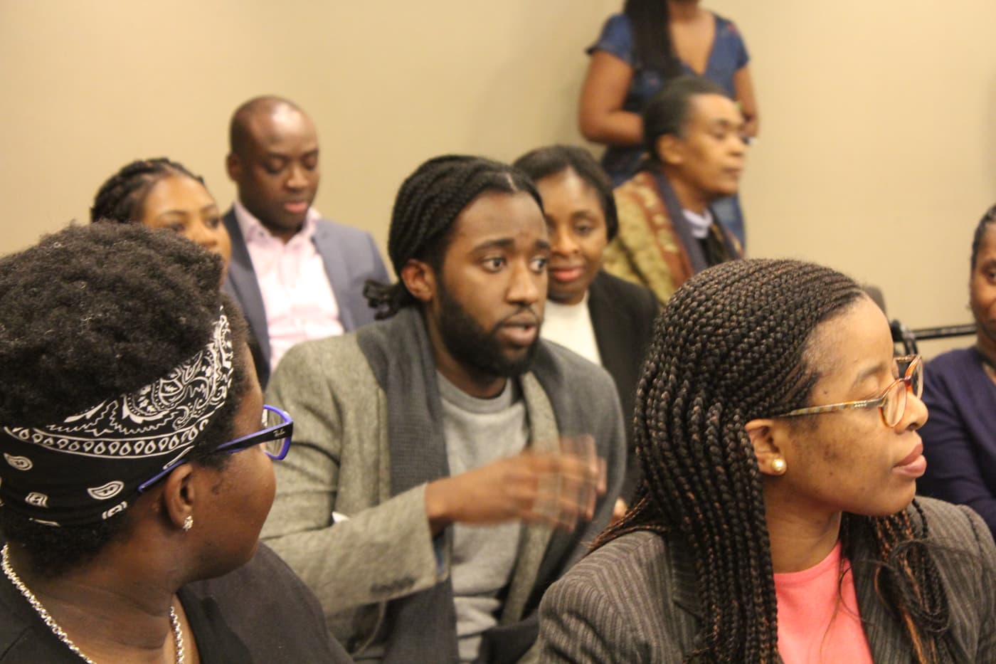 An attendee making a point to the room